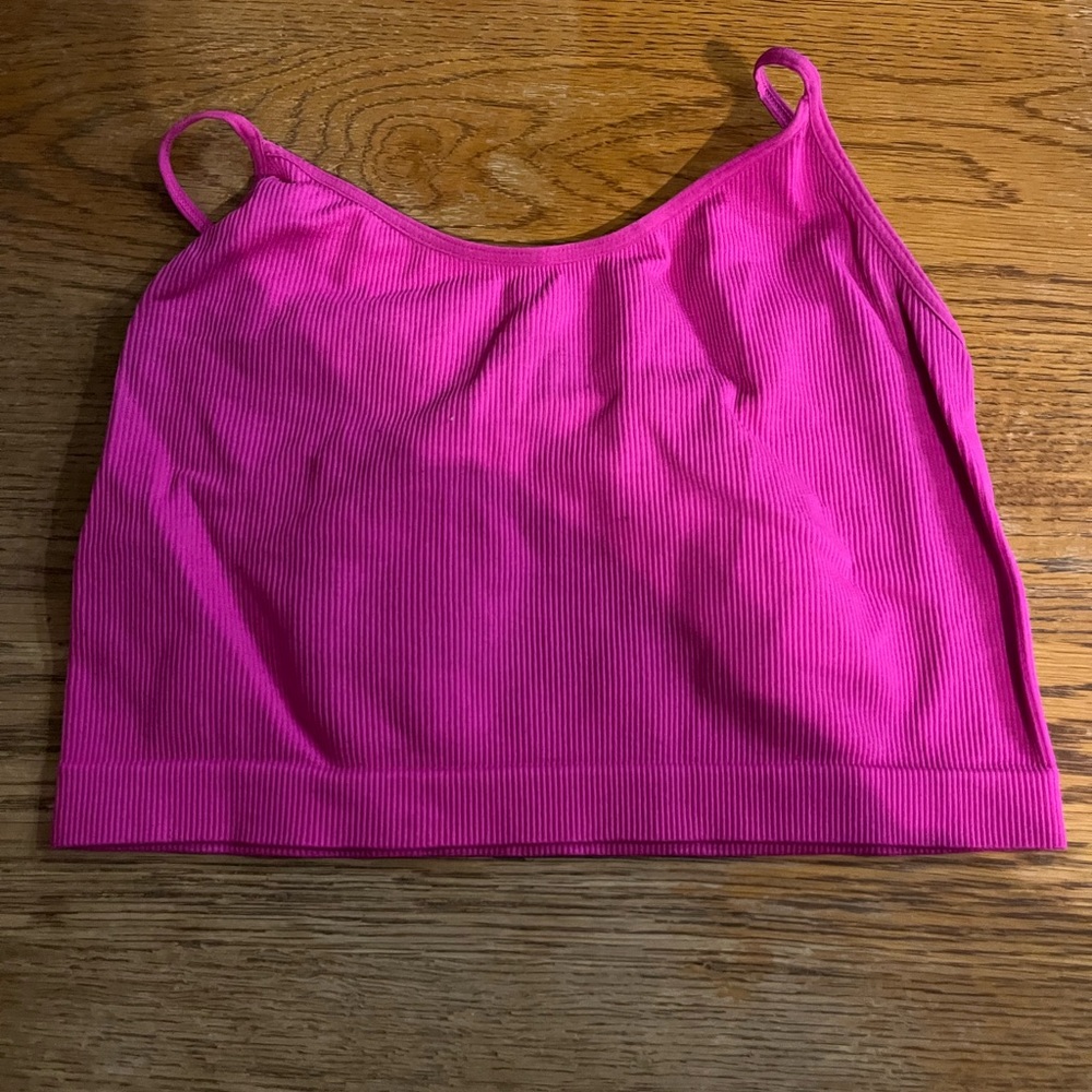 Two tank tops, one violet, one hot pink